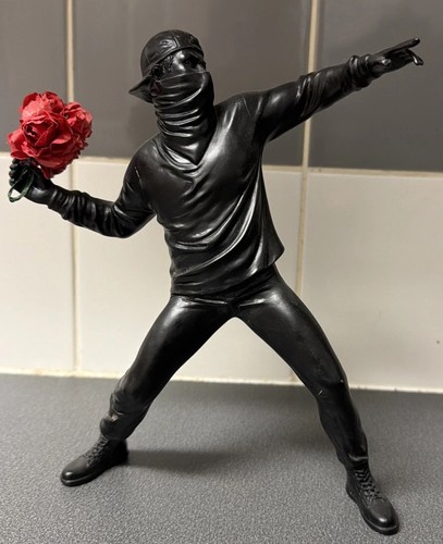Banksy flower thrower statue - banksy,