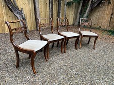 Antique Regency carved mahogany sabre leg dining chairs x 4