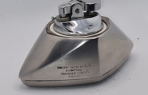 Strange sleek stainnless steel - strange,