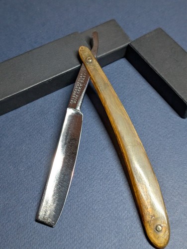 Old straight razor celebrated - razor,