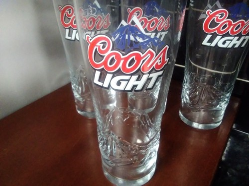 Four coors light beer one - four,