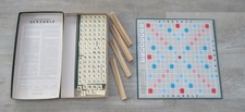 Vintage Scrabble word board game with wooden letter racks. Complete.