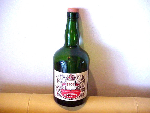 Empty green absinthe liquor - green,