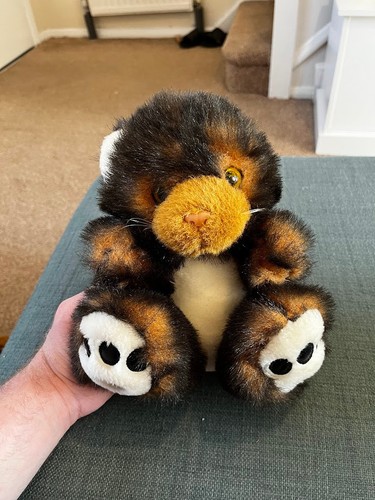 Brown cat sitting plush - brown,