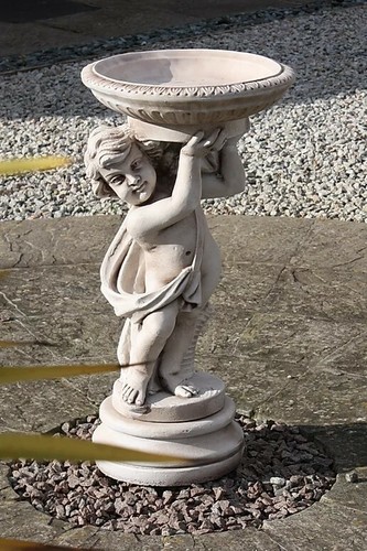 Stone concrete cherub - stone, bird