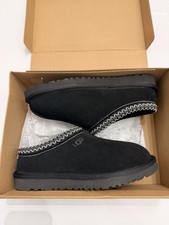 Never used black ugg - never,