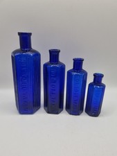 4 Blue Embossed Poison Bottles