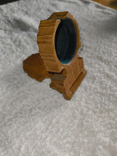 Hand carved wooden pocket - hand,
