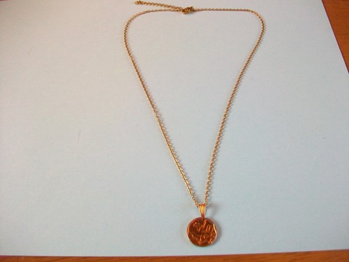 Ten cent coin arum - cent,