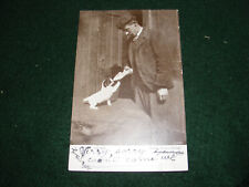 VINTAGE POSTCARD GENT BOTTLE FEED FEEDING PUPPY DOG "A LITTLE NIPPER" GREETING