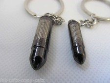 2x SOLID METAL BULLETS GUN KEYRING KEY CHAIN GIFT IDEA UK SELLER FREE P&P