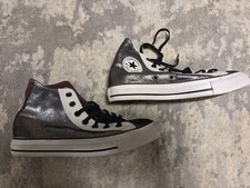 Converse Chuck Taylor All Star High Top in a Silver/White metallic finish