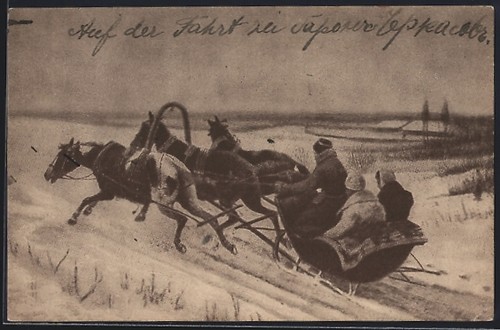 Couple being chauffeured - , by
