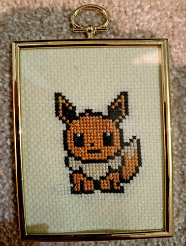 Framed finished cross stitched - cross,