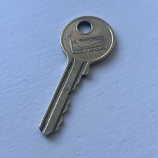 Vintage brass key branded - brass,