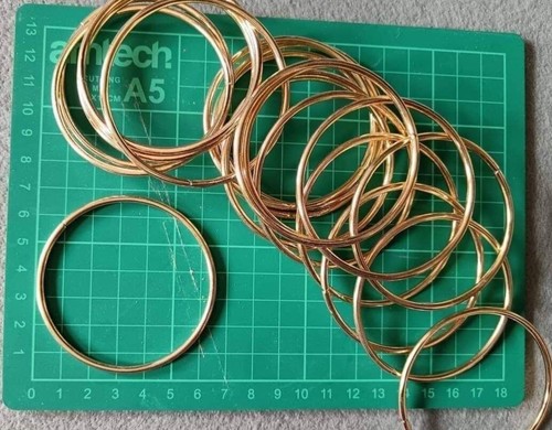 Gold tone metal hoops x - 10,