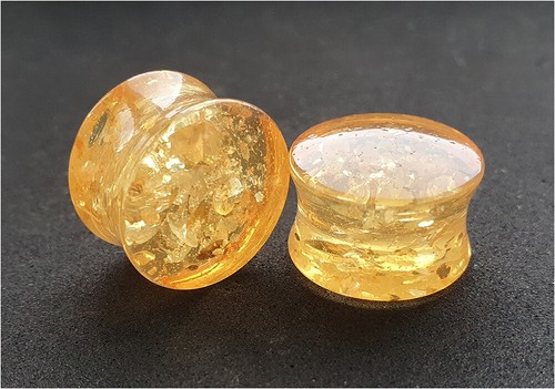 Synthetic amber resin ear - synthetic,