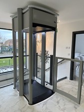 Stiltz through floor home lift