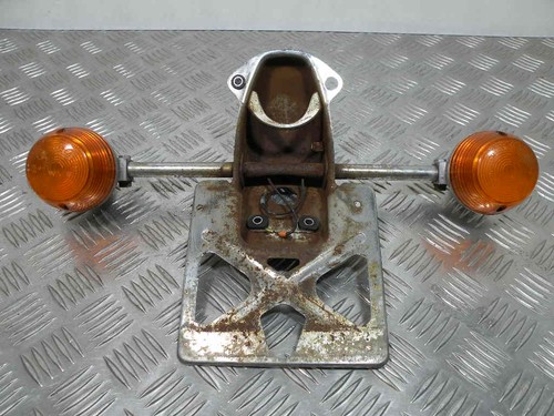 Rear turn signal with - , plate