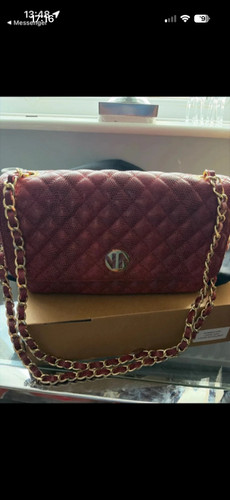 Nomination handbag for women
