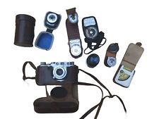 Leica IIf with leather case + Elmar 50mm f3.5, Elmar 90mm f4 and 6 light meters