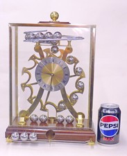 Comitti London Spherical Weight Skeleton Novelty Mantel Clock 8-day Spheroid