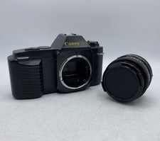 *Read* Vintage Canon T50 35mm SLR Film Camera + FD 50 1:1.8 Lens Prisma Filter
