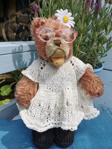 Hand knitted teddy bear