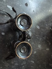 binoculars with the AUTEUIL"  This name refers to a neighborhood in Paris,