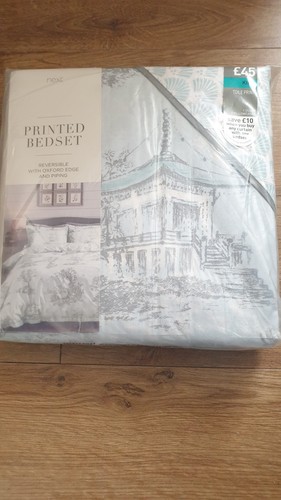 Next printed reversible with - next,