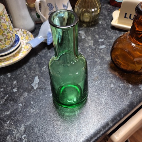 Hand blown green medicine - hand,