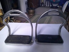A pair of bent leg stirrup