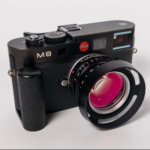 Leica with lenses and 2 - 2,