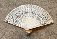 Lovely oriental wooden hand fan. 