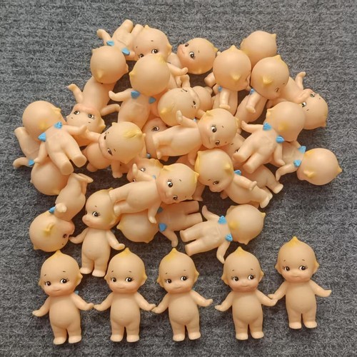 Lot soft plastic kewpie - of,