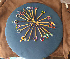 VINTAGE LACE MAKING WOOD BASED CUSHION AND WOOD MOSTLY GLASS SPANGLED BOBBINS