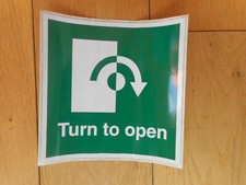 Turn to open right sticker -
