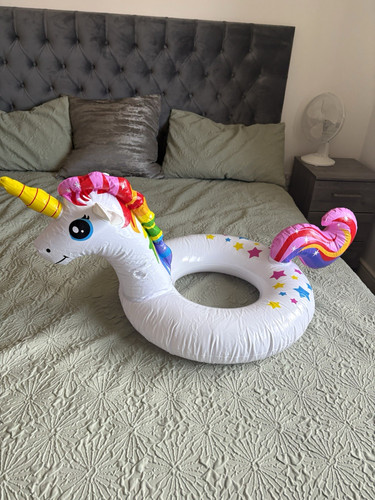 Inflatable red swimming noodle