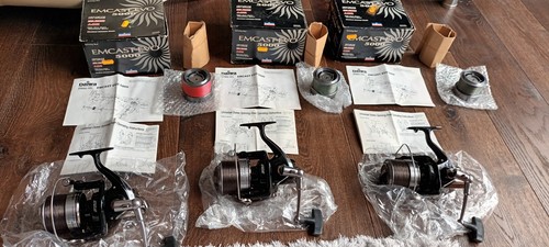 Three boxed diawa emcast - boxed,
