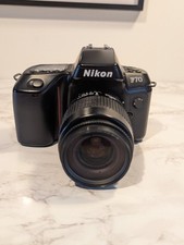 Nikon F70 35mm camera with AF Nikkor 35-80mm lens w/ new batteries, tested