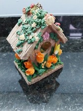 ORNATE RESIN BIRD HOUSE WITH
