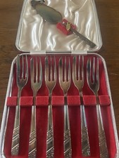 Silver played cake forks and - forks,