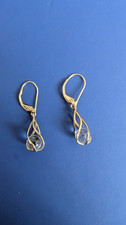 uri geller earrings gold