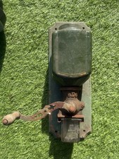 Tan old wall-mounted manual