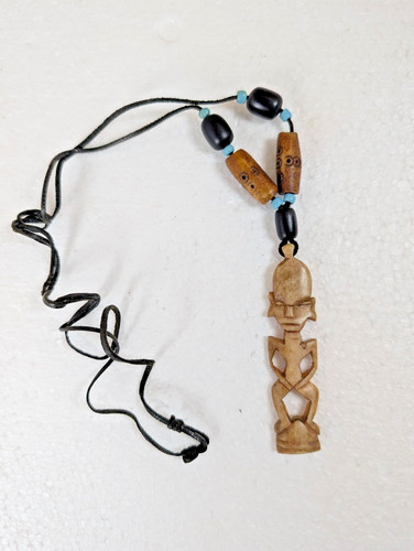 Hand carved tribal - hand‑carved,