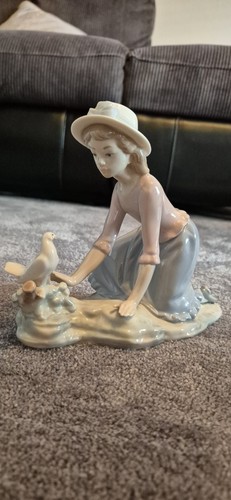 Nao lladro caressing the - nao,