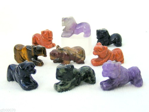 Gemstone lion and - tiger, hand