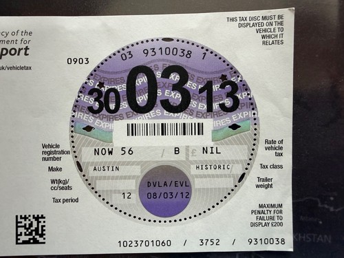 Road tax disc with - tax,