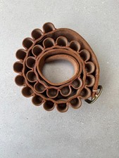 Vintage Brady 12 gauge, 25 cartridge leather belt. Dark tan with brass buckle