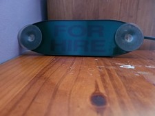 taxi for hire sign colour  black electric  cable working when removed  